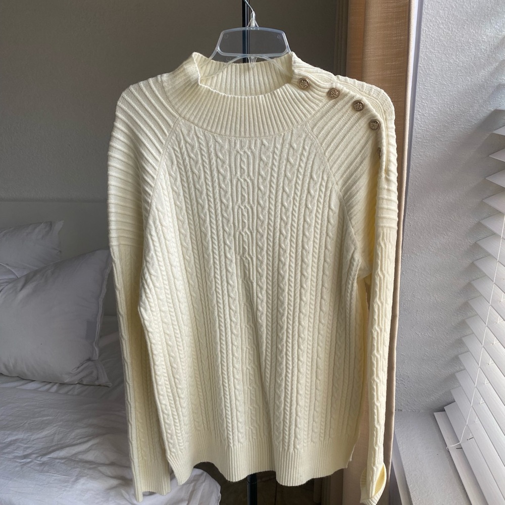 New cream sweater.